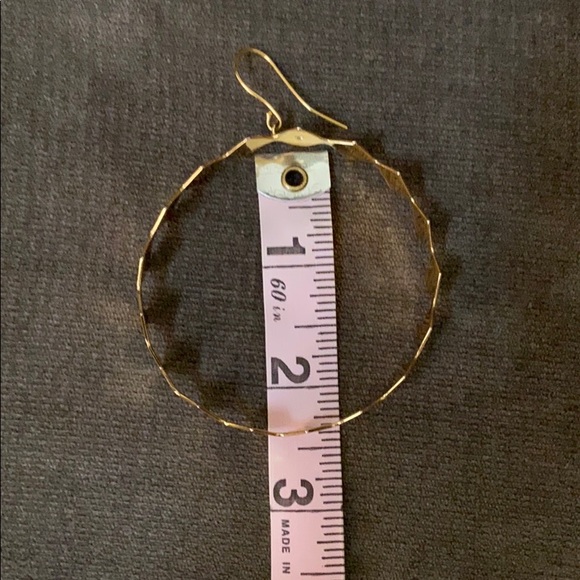 Oversized high shine gold hoop earrings - Picture 8 of 11